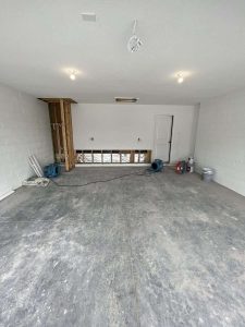 A+ Integrity Restoration specializes in water damage cleanup, drywall removal, and flooring restoration services. Damaged drywall removal and subflooring repair in a water damage restoration project.