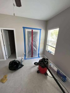 Water damage repair and drying services in a home, featuring professional equipment and containment measures for effective moisture removal and mold prevention by A+ Integrity Restoration. Water damage repair and mold removal by A+ Integrity Restoration, showcasing a cleaned and restored interior with professional tools and equipment for quick, reliable restoration services.
